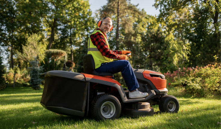Equipment owner riding on tractor