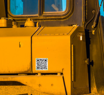 STX Garage QR code on machine